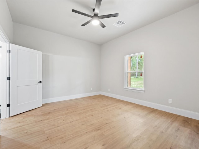 71 Prescott Dr, New Waverly, TX 77358 - empty room featuring light wood-type flooring, ceiling fan, and baseboards
