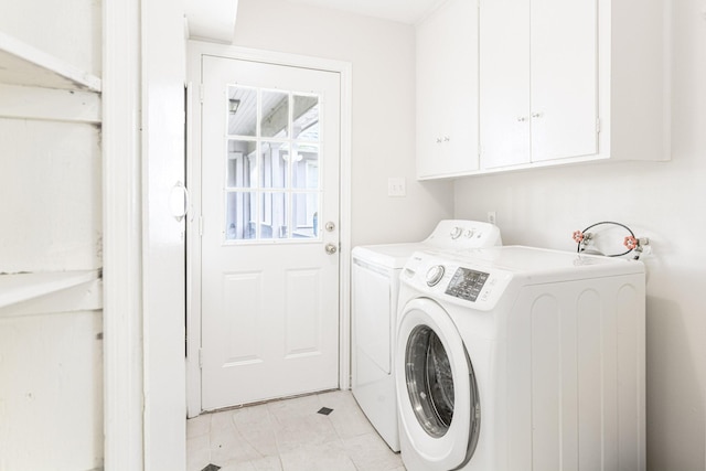 5247 Ariel St, Houston, TX 77096 - laundry area with washer and dryer and cabinet space