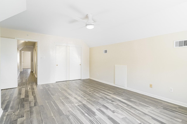 5247 Ariel St, Houston, TX 77096 - additional living space with a ceiling fan, wood finished floors, vaulted ceiling, and baseboards
