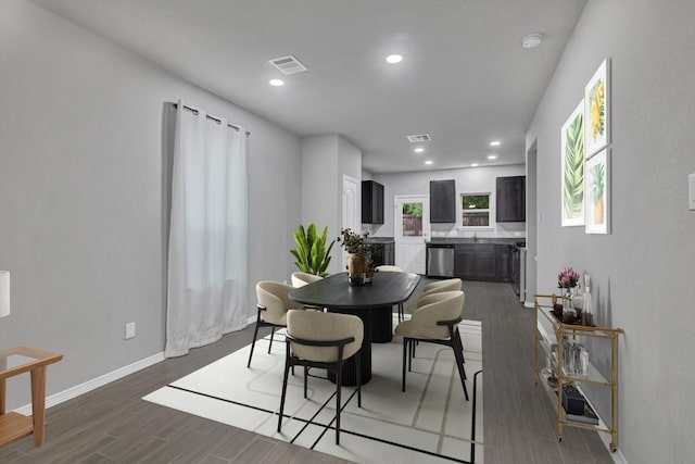 24742 Russet Bluff Trl, Houston, TX 77336 - dining space featuring dark wood finished floors, recessed lighting, and baseboards