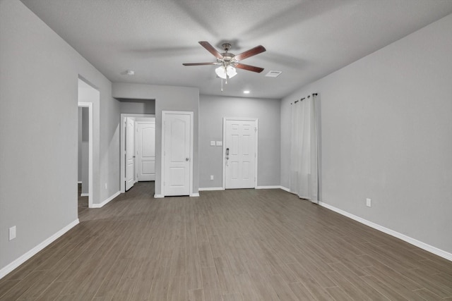 24742 Russet Bluff Trl, Houston, TX 77336 - empty room with ceiling fan, baseboards, and wood finished floors