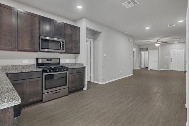24742 Russet Bluff Trl, Houston, TX 77336 - kitchen featuring appliances with stainless steel finishes, baseboards, recessed lighting, ceiling fan, and dark brown cabinetry