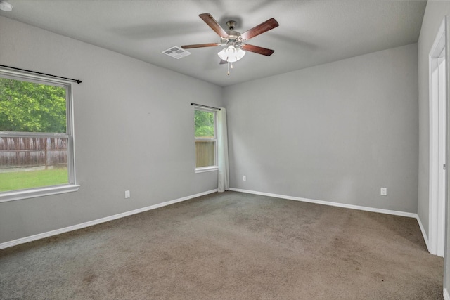 24742 Russet Bluff Trl, Houston, TX 77336 - empty room featuring a ceiling fan, carpet floors, and baseboards