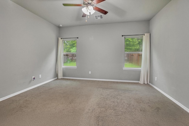 24742 Russet Bluff Trl, Houston, TX 77336 - spare room featuring a ceiling fan, carpet floors, and baseboards