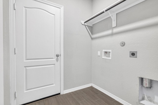 24742 Russet Bluff Trl, Houston, TX 77336 - laundry room with hookup for a gas dryer, electric dryer hookup, hookup for a washing machine, baseboards, and dark wood finished floors