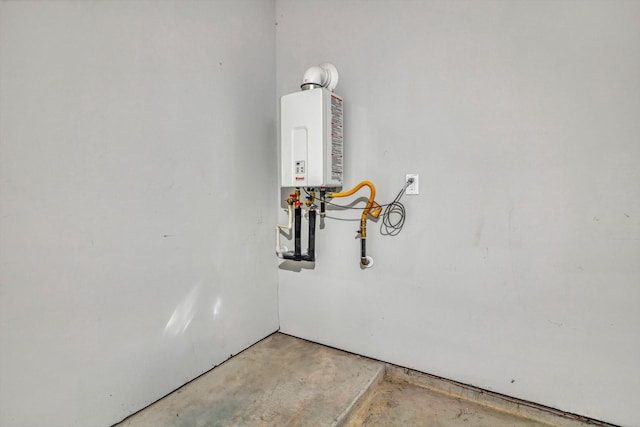 24742 Russet Bluff Trl, Houston, TX 77336 - detailed view of concrete flooring and water heater