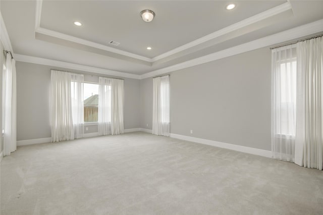 26510 Crimson Bluff Ln, Katy, TX 77494 - spare room with a tray ceiling, ornamental molding, healthy amount of natural light, and recessed lighting