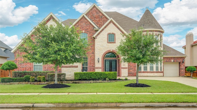 26510 Crimson Bluff Ln, Katy, TX 77494 - view of front facade with brick siding, roof with shingles, an attached garage, and concrete driveway