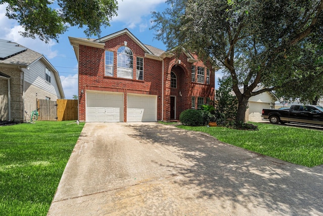 18530 S Wimbledon Dr, Katy, TX 77449 - traditional-style home with brick siding, driveway, and an attached garage
