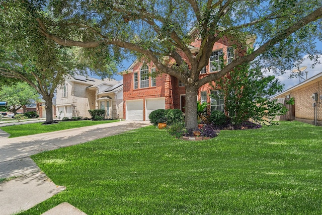 18530 S Wimbledon Dr, Katy, TX 77449 - traditional home featuring a garage, concrete driveway, and brick siding