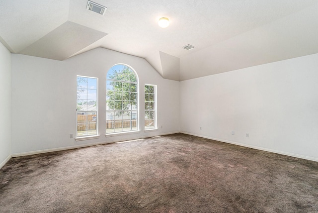 18530 S Wimbledon Dr, Katy, TX 77449 - bonus room featuring carpet, vaulted ceiling, and baseboards