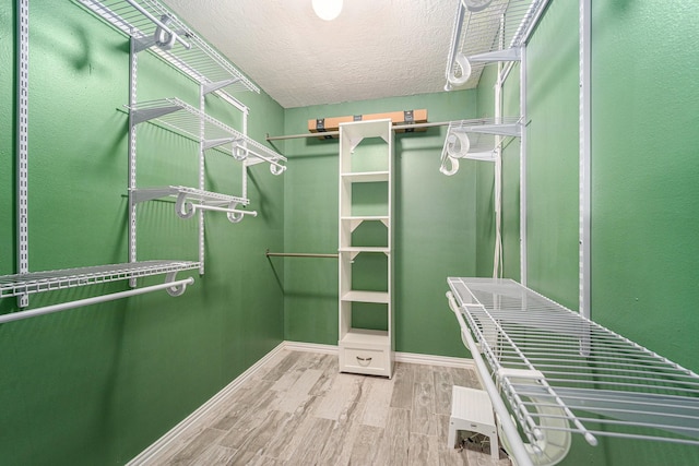18530 S Wimbledon Dr, Katy, TX 77449 - spacious closet with wood finished floors