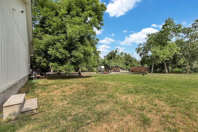 1037 Wall St, Houston, TX 77088 - view of green lawn with view of scattered trees