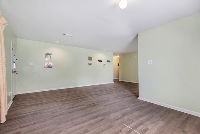 1037 Wall St, Houston, TX 77088 - unfurnished room featuring wood finished floors, baseboards, and recessed lighting