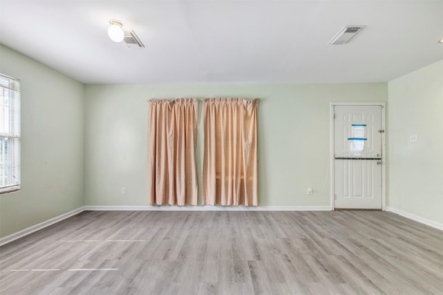 1037 Wall St, Houston, TX 77088 - unfurnished room featuring wood finished floors and baseboards