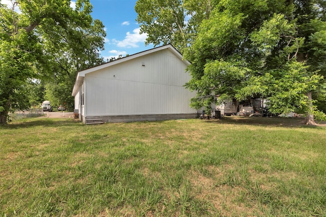 1037 Wall St, Houston, TX 77088 - view of home's exterior featuring a yard