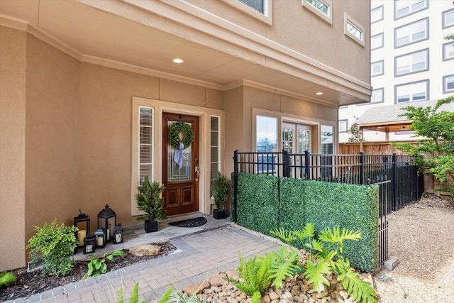 18731 Egret Oaks Ln, Webster, TX 77058 - doorway to property featuring stucco siding