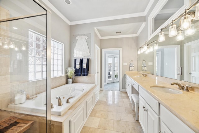 18731 Egret Oaks Ln, Webster, TX 77058 - bathroom with a whirlpool tub, double vanity, ornamental molding, and a shower with shower door