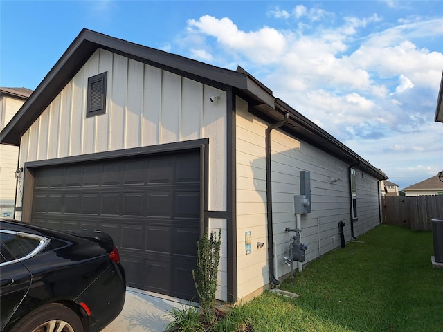 21402 Rising Fawn Rd, Porter, TX 77365 - view of property exterior with board and batten siding and an attached garage