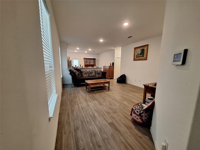 21402 Rising Fawn Rd, Porter, TX 77365 - living room featuring light wood-type flooring, healthy amount of natural light, baseboards, and recessed lighting