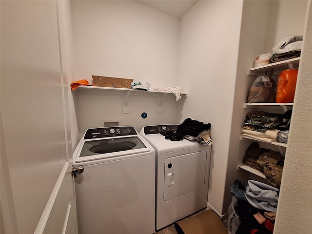 21402 Rising Fawn Rd, Porter, TX 77365 - washroom featuring washer and clothes dryer