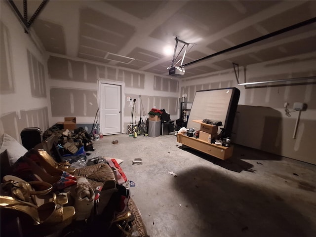 21402 Rising Fawn Rd, Porter, TX 77365 - garage featuring a garage door opener