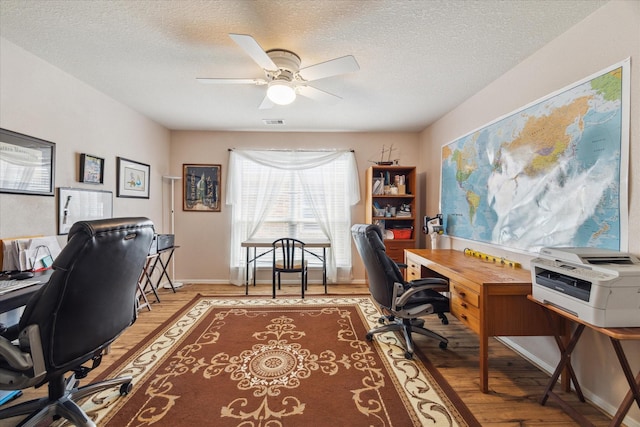18719 Cypress Lake Village Dr, Cypress, TX 77429 - office space with light wood-style flooring, a textured ceiling, and a ceiling fan