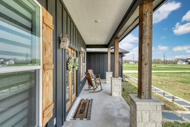 5315 Hammond Cir, Iola, TX 77861 - covered porch featuring a yard