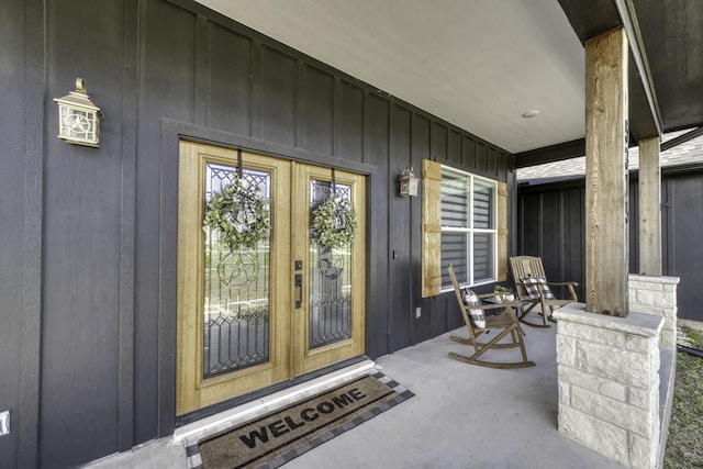 5315 Hammond Cir, Iola, TX 77861 - doorway to property featuring board and batten siding and covered porch
