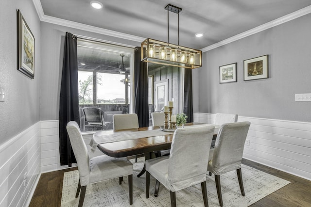5315 Hammond Cir, Iola, TX 77861 - dining area with ornamental molding, wainscoting, wood finished floors, wooden walls, and recessed lighting