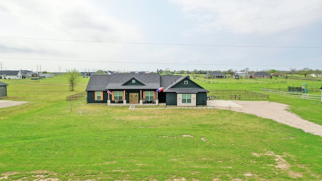 5315 Hammond Cir, Iola, TX 77861 - view of front of home featuring a porch, driveway, and a view of countryside