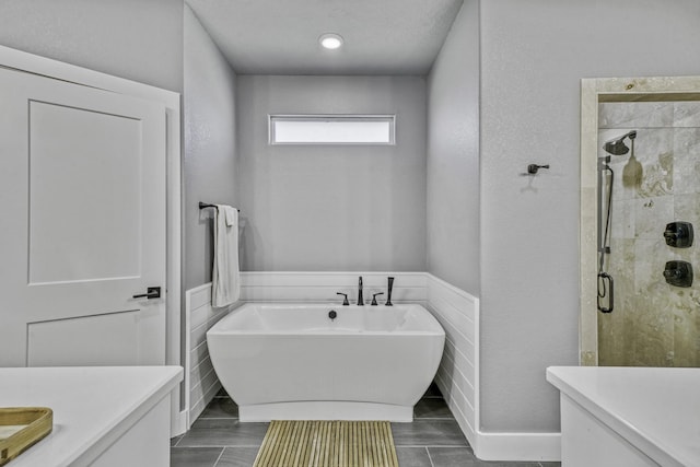 5315 Hammond Cir, Iola, TX 77861 - bathroom with a freestanding bath, a stall shower, and vanity