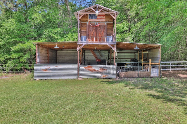 24240 Oak Hollow Blvd, Hockley, TX 77447 - view of front of home featuring an exterior structure, an outdoor structure, and a front lawn