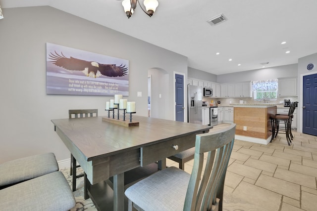24240 Oak Hollow Blvd, Hockley, TX 77447 - dining room with arched walkways and recessed lighting