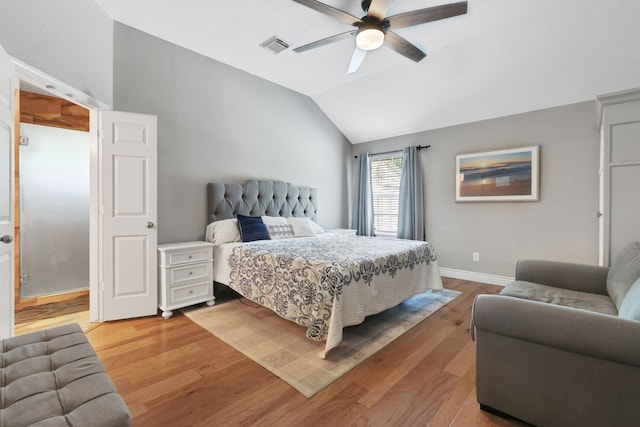 24240 Oak Hollow Blvd, Hockley, TX 77447 - bedroom with light wood-style flooring, lofted ceiling, ceiling fan, and baseboards