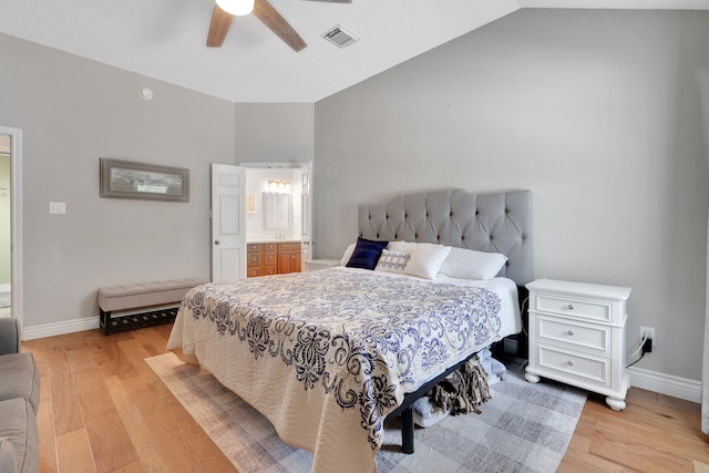 24240 Oak Hollow Blvd, Hockley, TX 77447 - bedroom with light wood finished floors, baseboards, vaulted ceiling, a ceiling fan, and ensuite bathroom