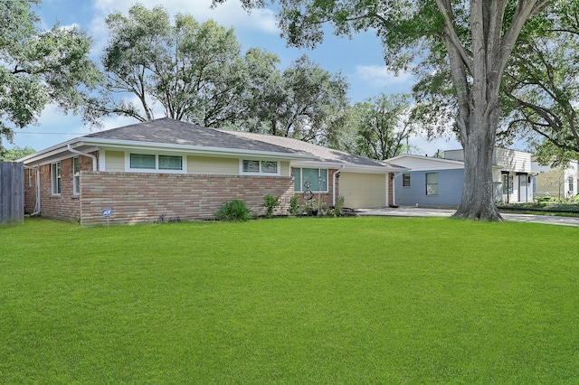 5623 Cerritos Dr, Houston, TX 77035 - view of front of home with brick siding, a garage, a front yard, driveway, and roof with shingles