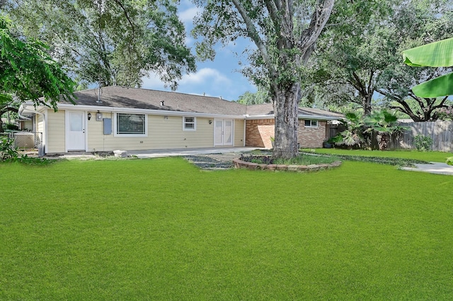 5623 Cerritos Dr, Houston, TX 77035 - rear view of property with a patio area
