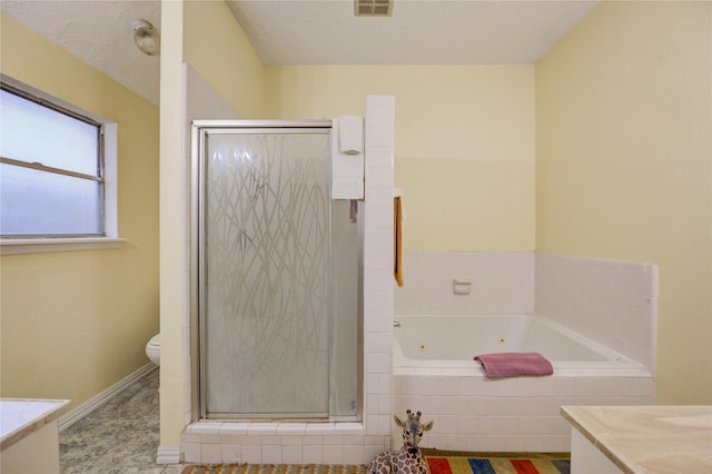 4406 Hidden Trace Ct, Houston, TX 77066 - bathroom with vanity, a whirlpool tub, toilet, and a stall shower