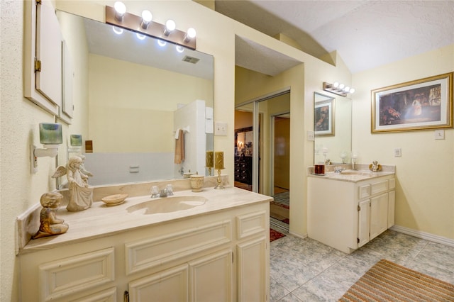 4406 Hidden Trace Ct, Houston, TX 77066 - full bath with two vanities and tile patterned flooring