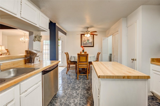4406 Hidden Trace Ct, Houston, TX 77066 - kitchen with butcher block countertops, stainless steel dishwasher, ceiling fan, white cabinetry, and a sink