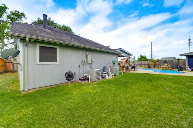 4406 Hidden Trace Ct, Houston, TX 77066 - back of property with central AC and roof with shingles