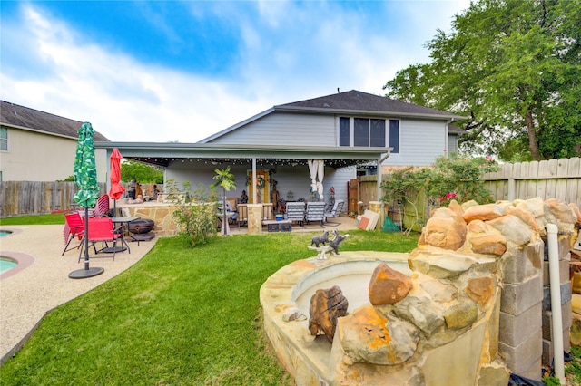 4406 Hidden Trace Ct, Houston, TX 77066 - back of property featuring a patio and an outdoor fire pit