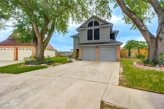 4406 Hidden Trace Ct, Houston, TX 77066 - traditional-style house featuring brick siding, a garage, and driveway