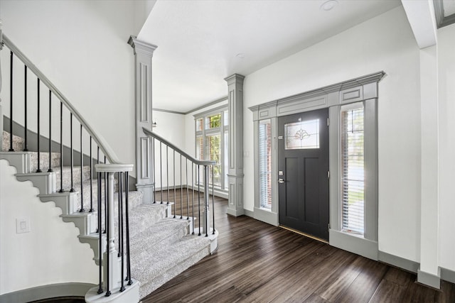 18715 Big Cypress Dr, Spring, TX 77388 - foyer entrance featuring wood finished floors, stairway, decorative columns, and baseboards
