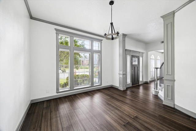 18715 Big Cypress Dr, Spring, TX 77388 - unfurnished dining area with baseboards, dark wood finished floors, a chandelier, and crown molding