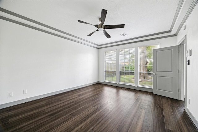 18715 Big Cypress Dr, Spring, TX 77388 - spare room featuring crown molding, dark wood-style flooring, a ceiling fan, and baseboards