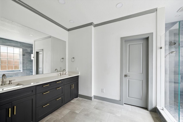 18715 Big Cypress Dr, Spring, TX 77388 - full bath with double vanity, a stall shower, ornamental molding, baseboards, and tile patterned flooring