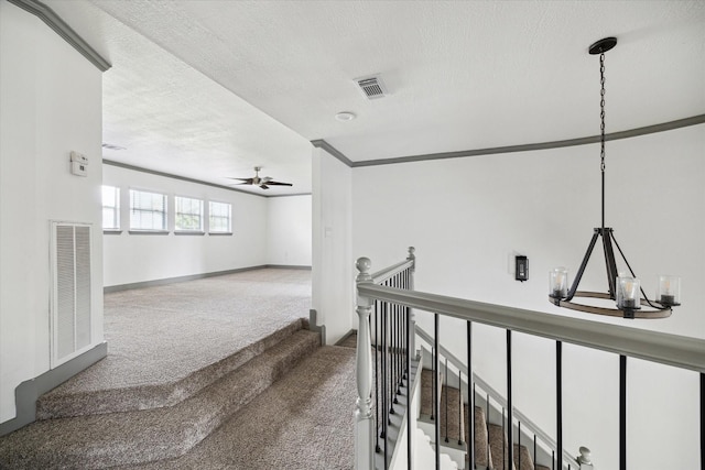 18715 Big Cypress Dr, Spring, TX 77388 - hallway featuring carpet floors, a chandelier, a textured ceiling, baseboards, and an upstairs landing