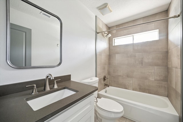 18715 Big Cypress Dr, Spring, TX 77388 - full bath with vanity, toilet, shower / tub combination, and a textured ceiling